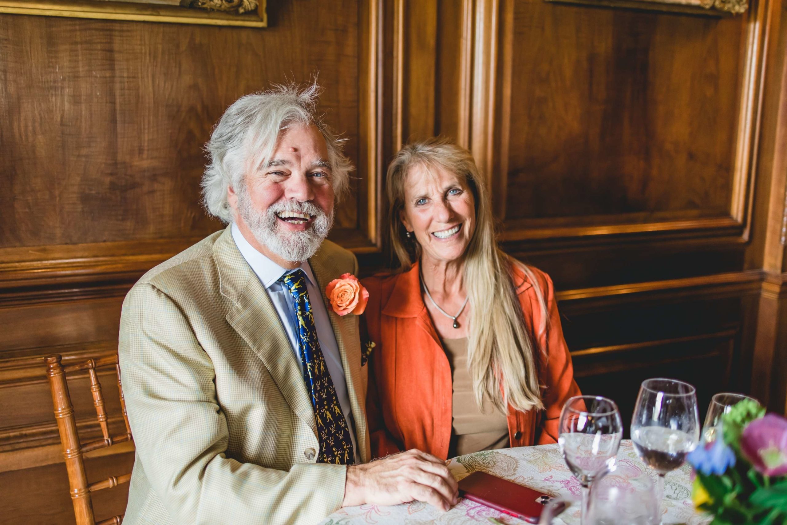Members of the Thouron Family smiling and seated at a table for the Thouron Award Welcome Party 2022