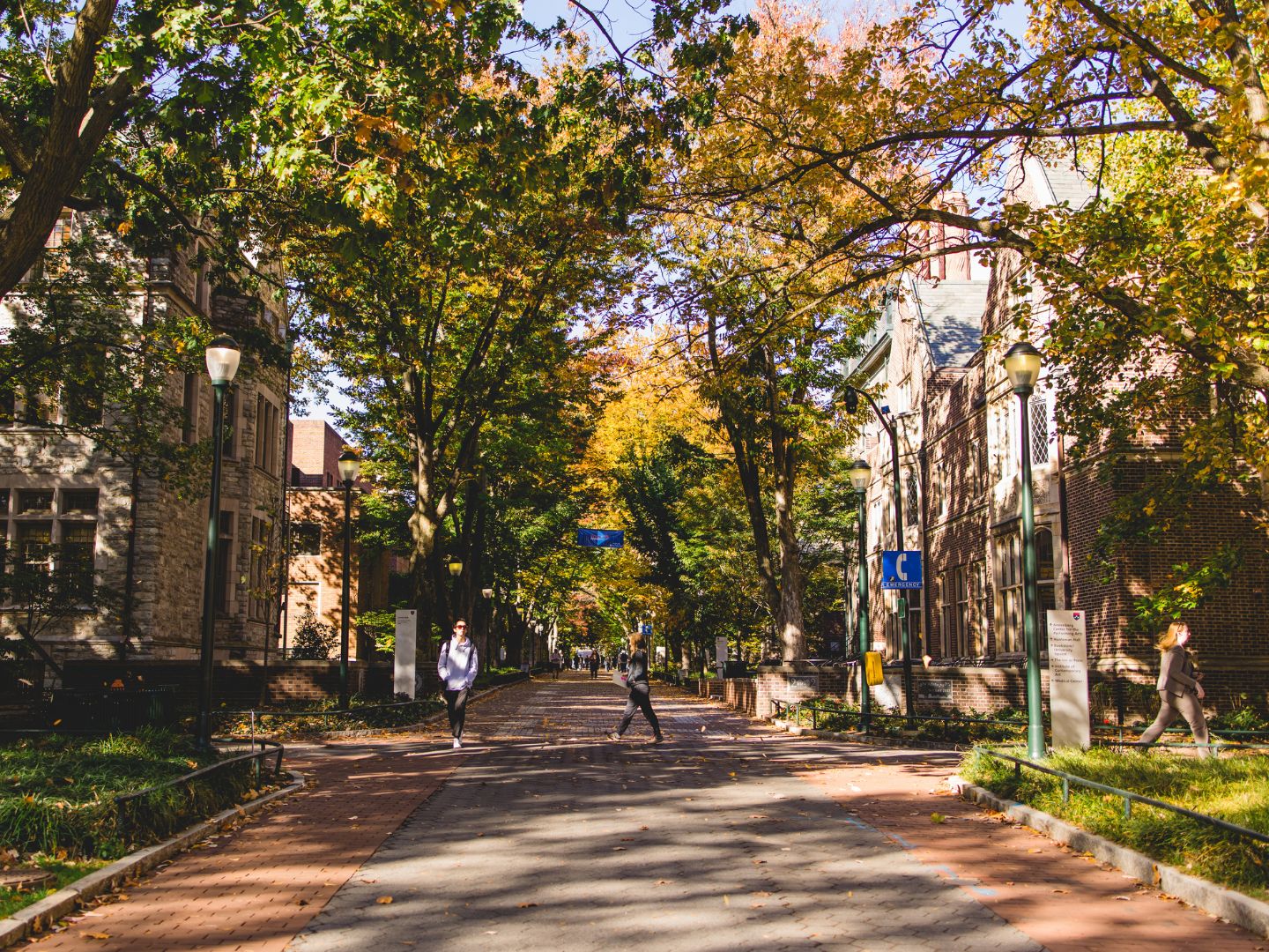 Students walk along Locust Walk on the University of Pennsylvania campus