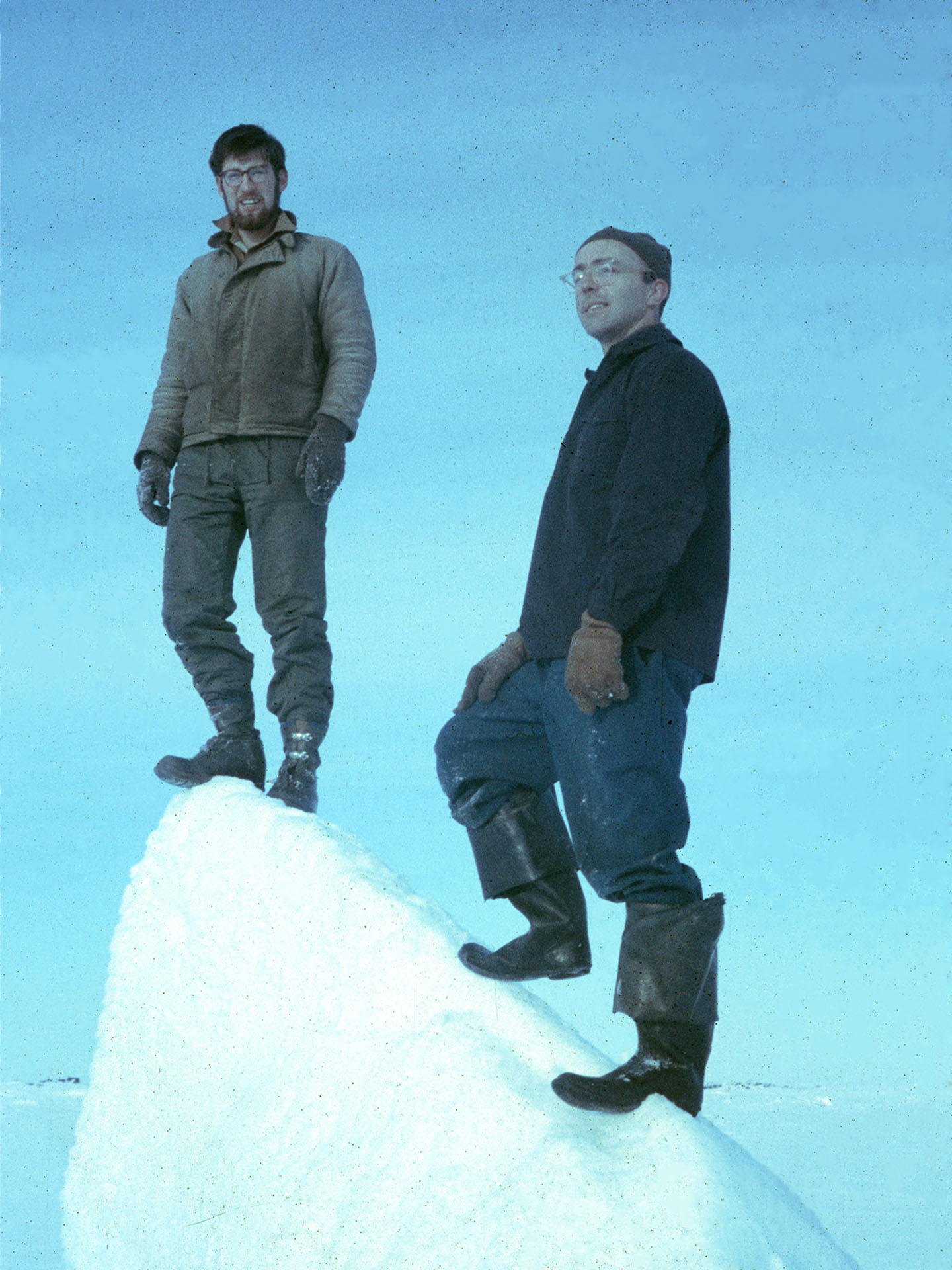John and his Boss, Columbia University scientist Dr. Ken Hunkins, on a pressure ridge at Ice Station T-3, summer of 1963, in the Arctic Ocean, 700 miles N of Point Barrow, 300 mi S. of North Pole.