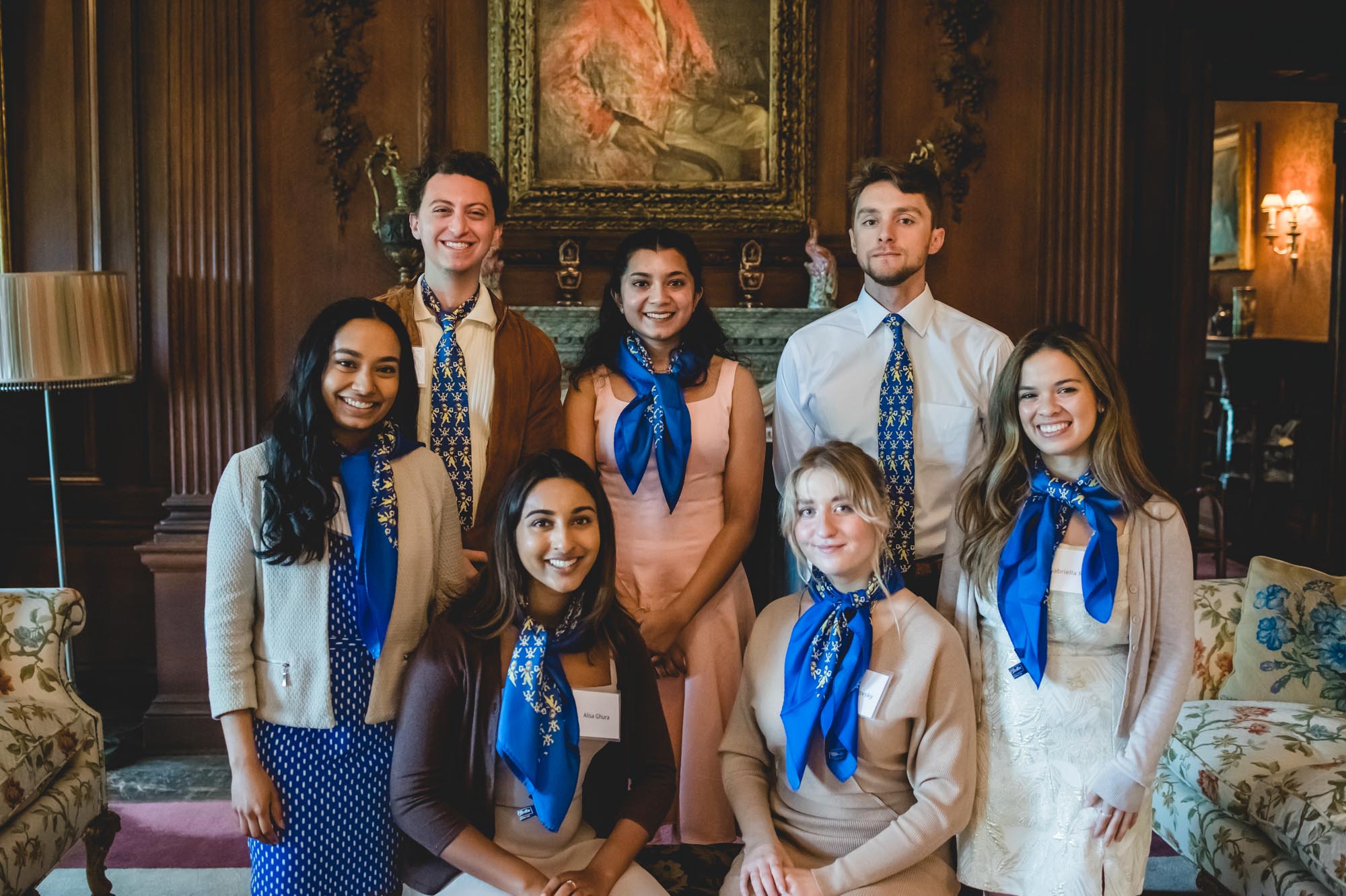 American Scholars who will be studying in the U.K. next year pose for a group photo wearing their scarves and ties.