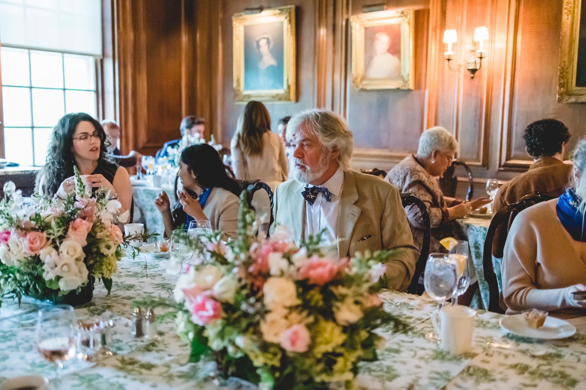 Rupert Thouron chats over the luncheon table with new Scholars and Alumni