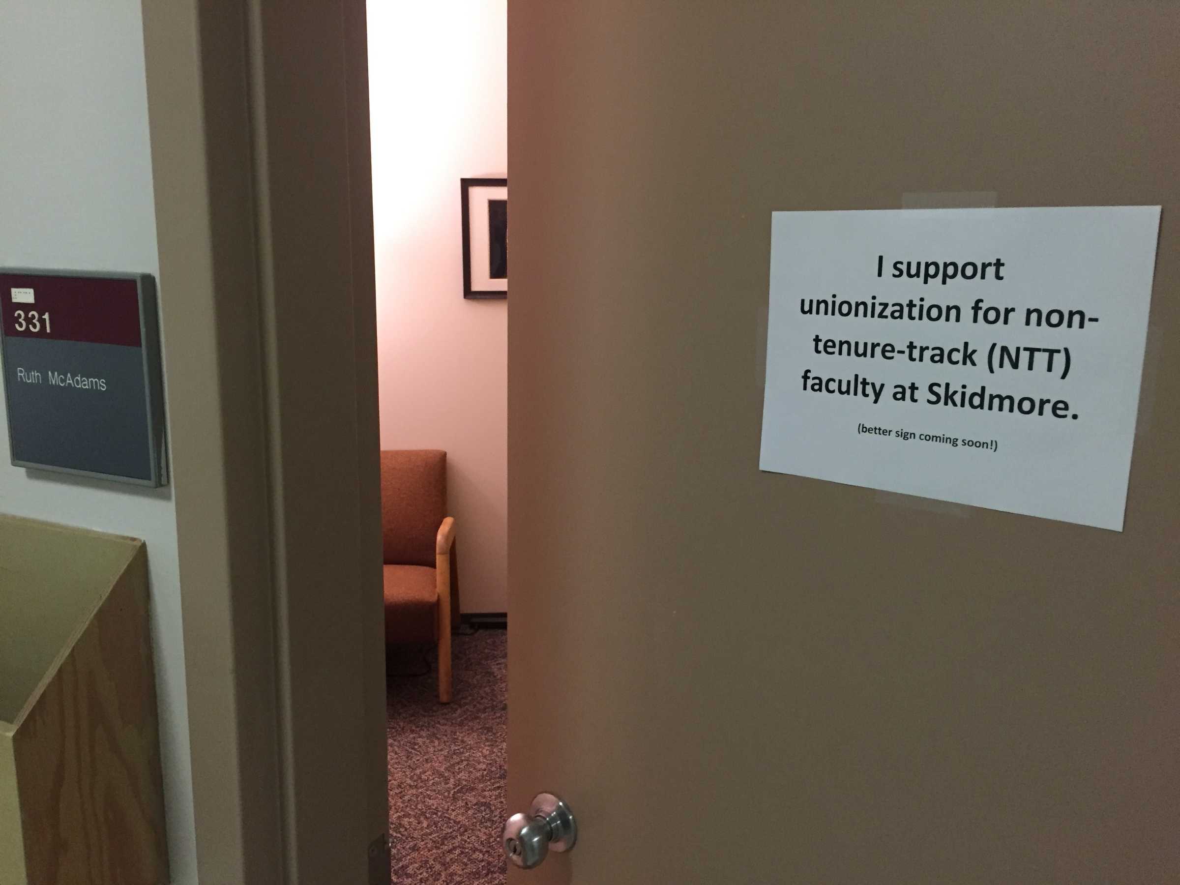 Photograph of Ruth's office door with sign supporting unionisation at Skidmore College
